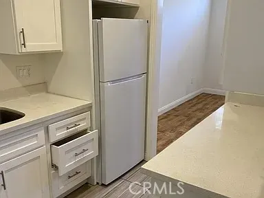 a view of a bathroom with a glass door
