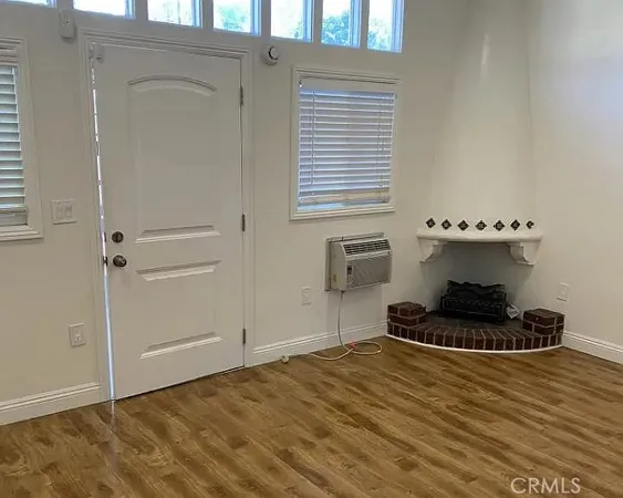 a bathroom with a sink and a window
