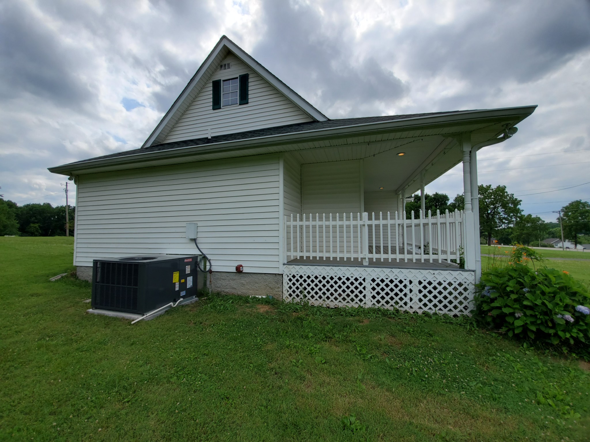 970 Chicken Road Lebanon, TN 37090 - Photo 3 of 11 a front view of a house with a garden