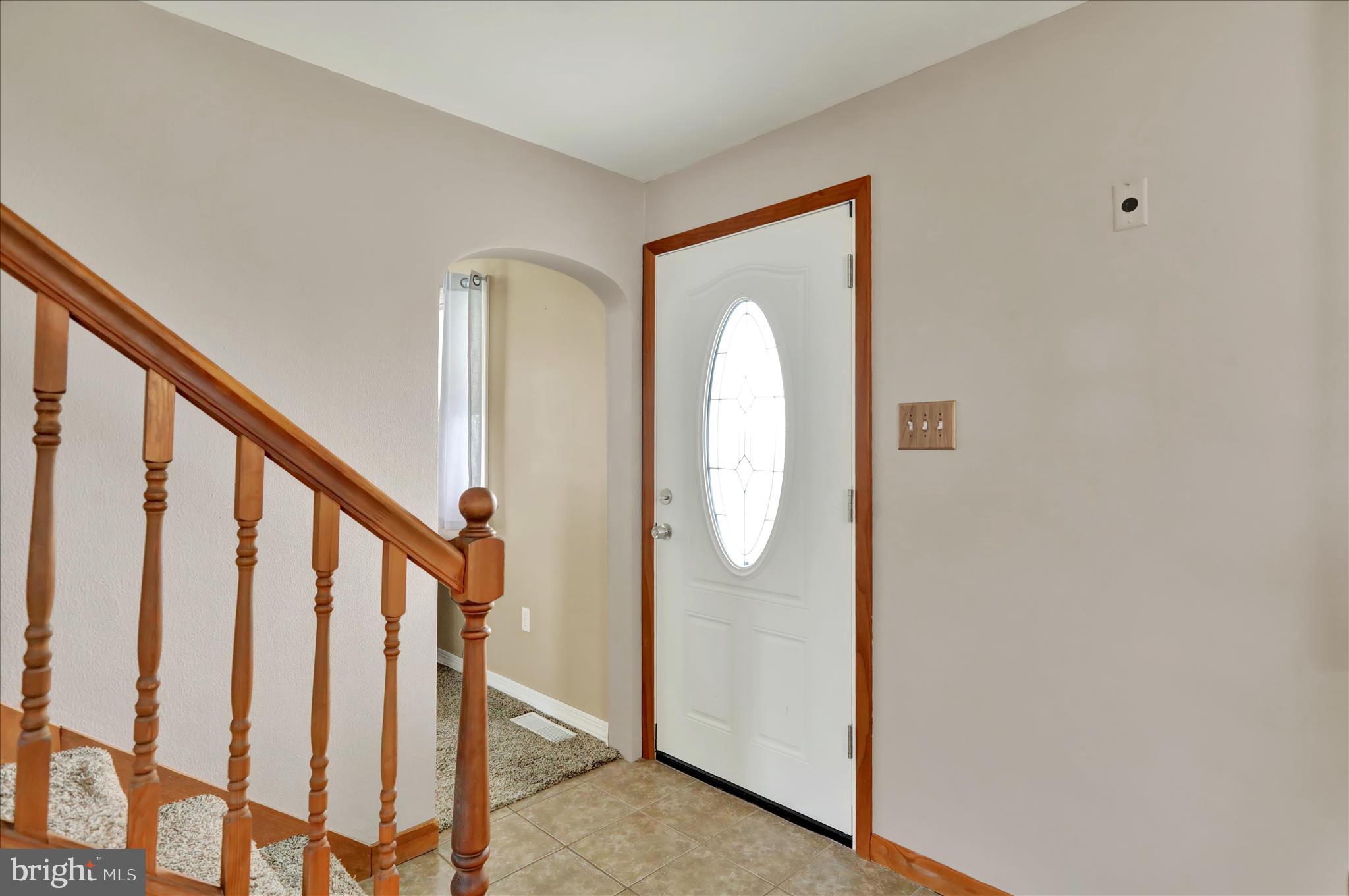 3027 Limekiln Road Birdsboro, PA 19508 - Photo 12 of 37 a view of staircase with railing and a painting on the wall