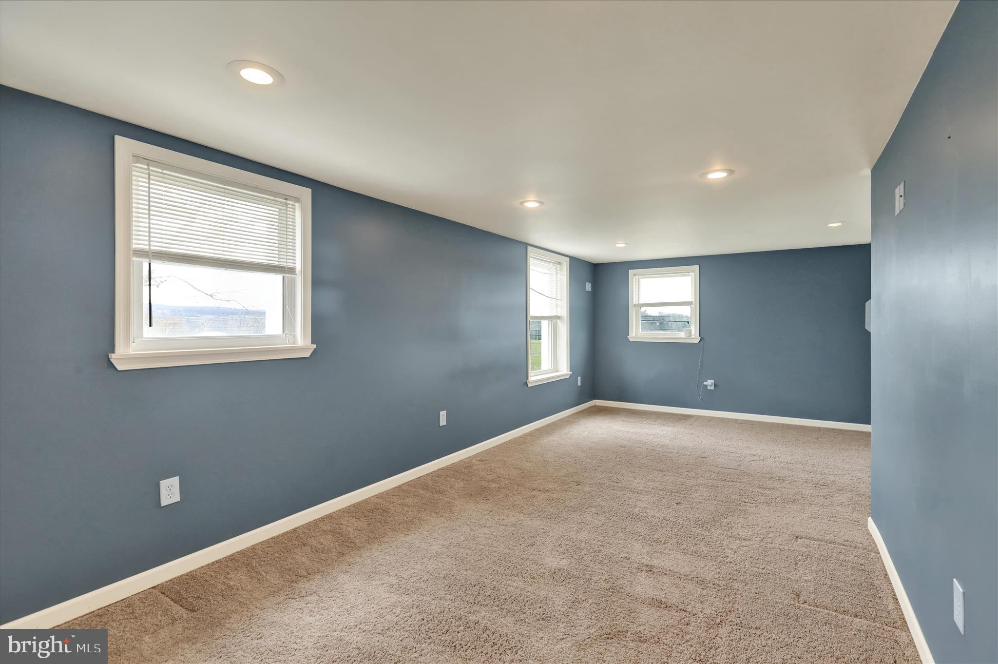 3027 Limekiln Road Birdsboro, PA 19508 - Photo 16 of 37 a view of an empty room with windows