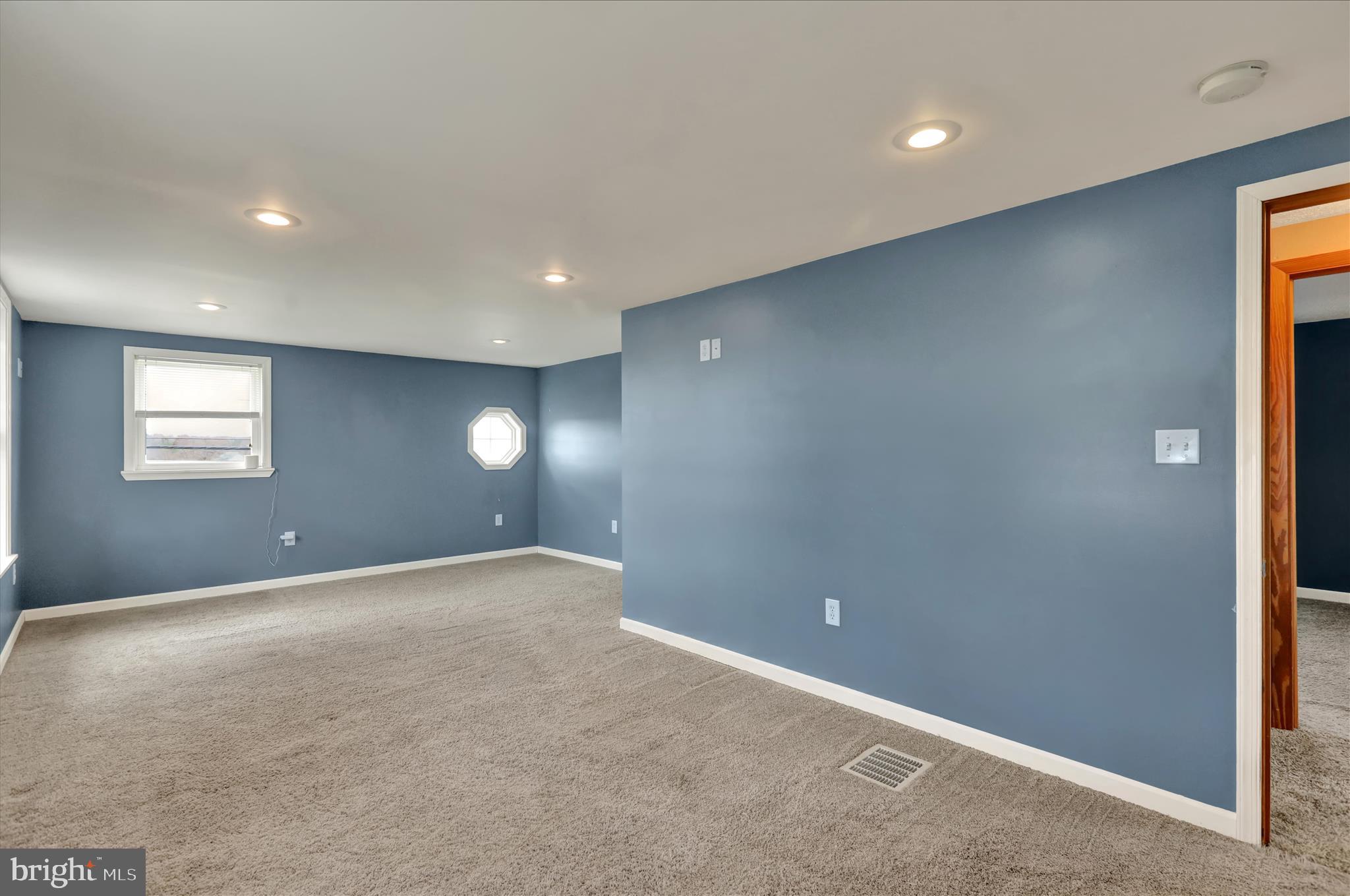 3027 Limekiln Road Birdsboro, PA 19508 - Photo 17 of 37 a view of an empty room with a window