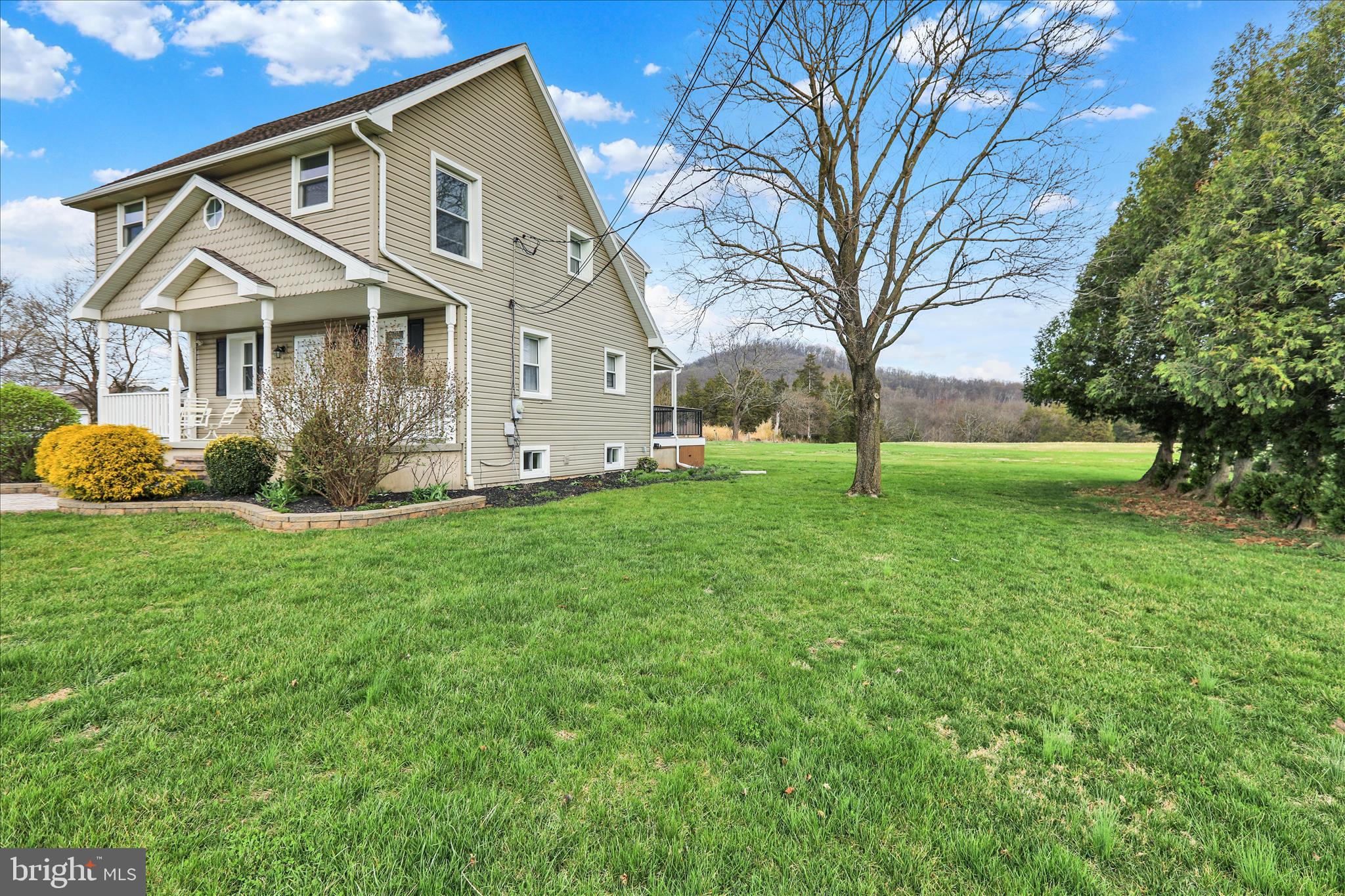 3027 Limekiln Road Birdsboro, PA 19508 - Photo 2 of 37 a front view of a house with garden