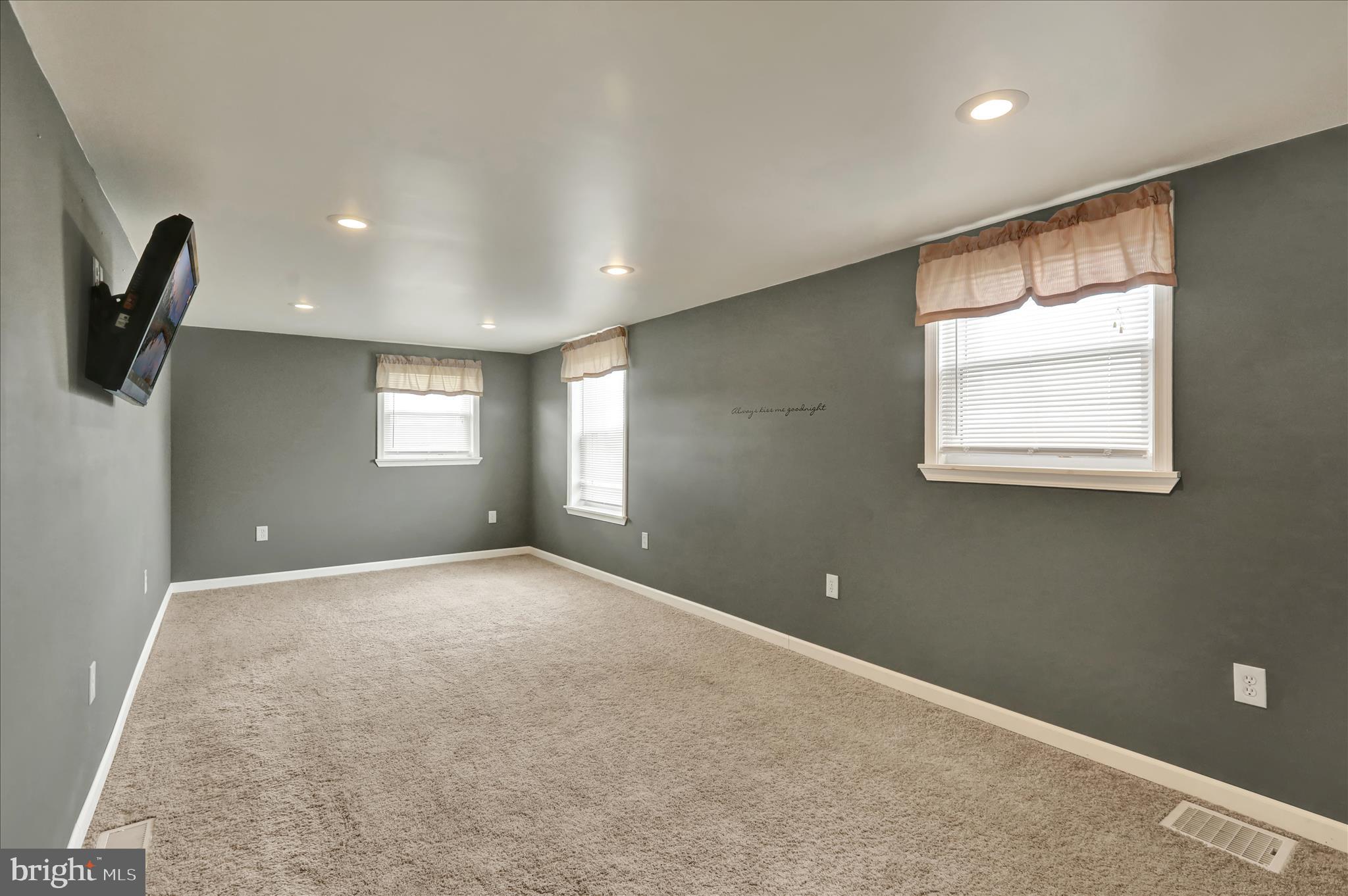 3027 Limekiln Road Birdsboro, PA 19508 - Photo 22 of 37 a view of an empty room with a window