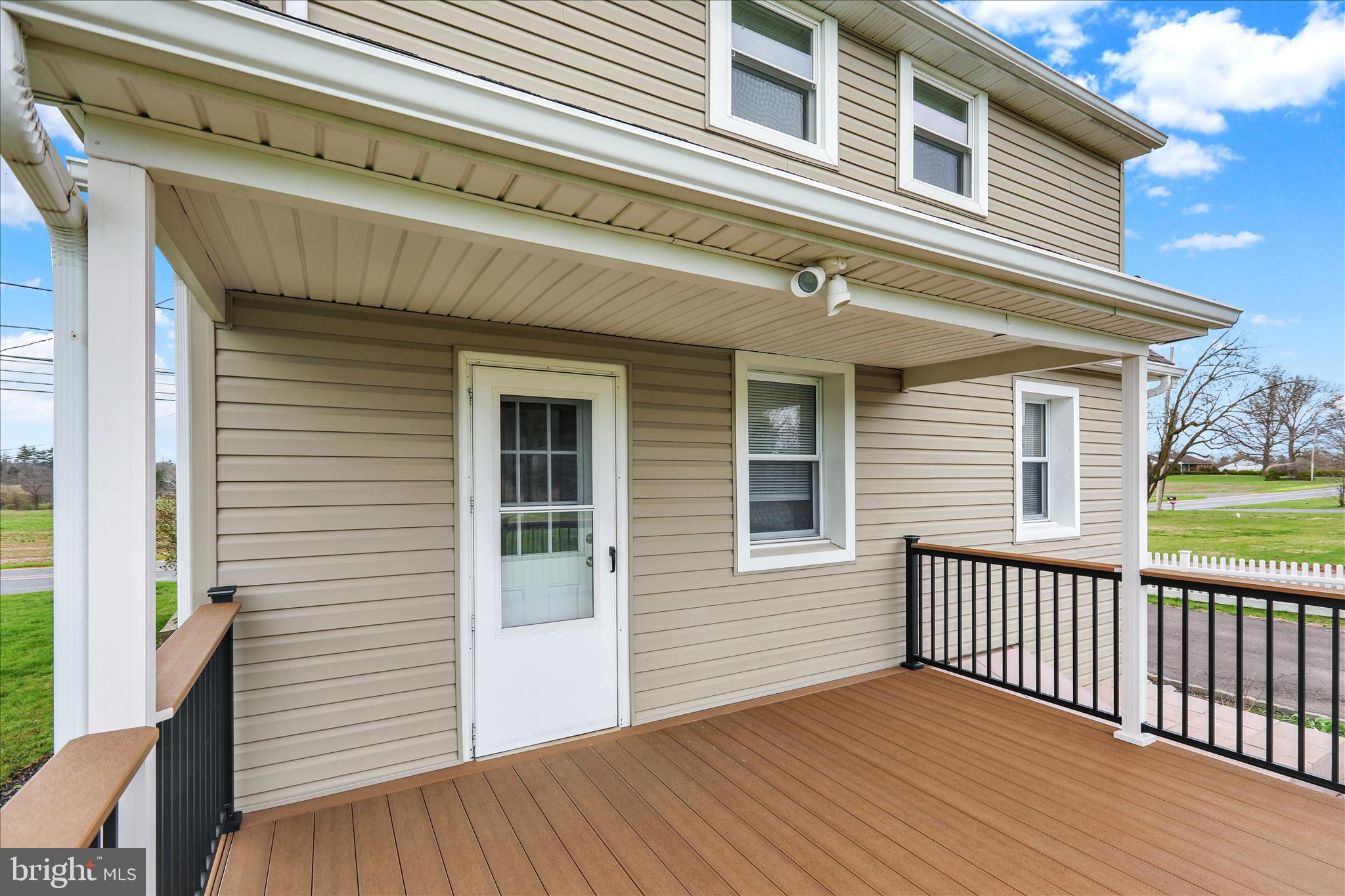3027 Limekiln Road Birdsboro, PA 19508 - Photo 31 of 37 a view of a house with wooden deck