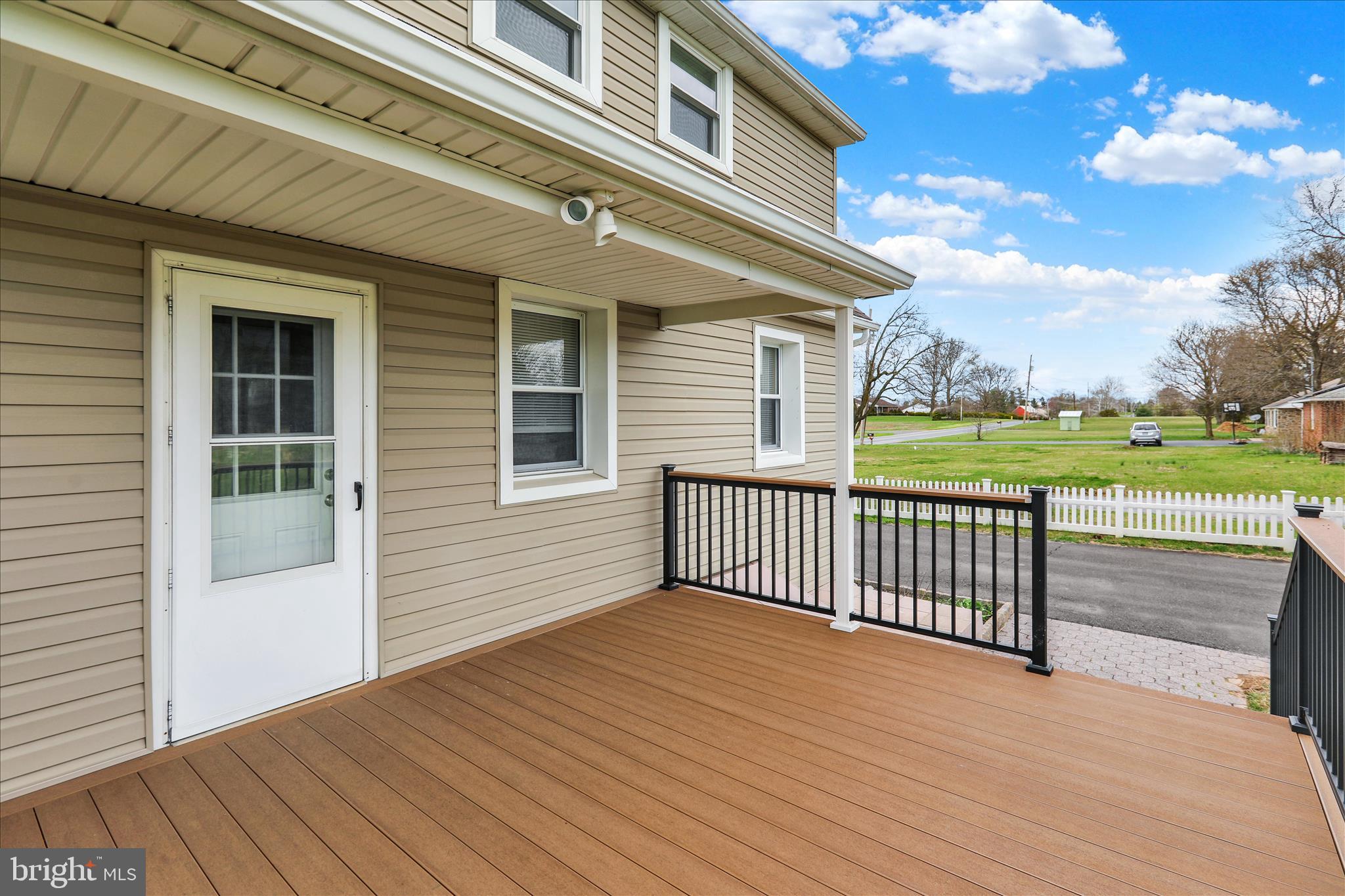 3027 Limekiln Road Birdsboro, PA 19508 - Photo 32 of 37 a view of a house with a wooden deck