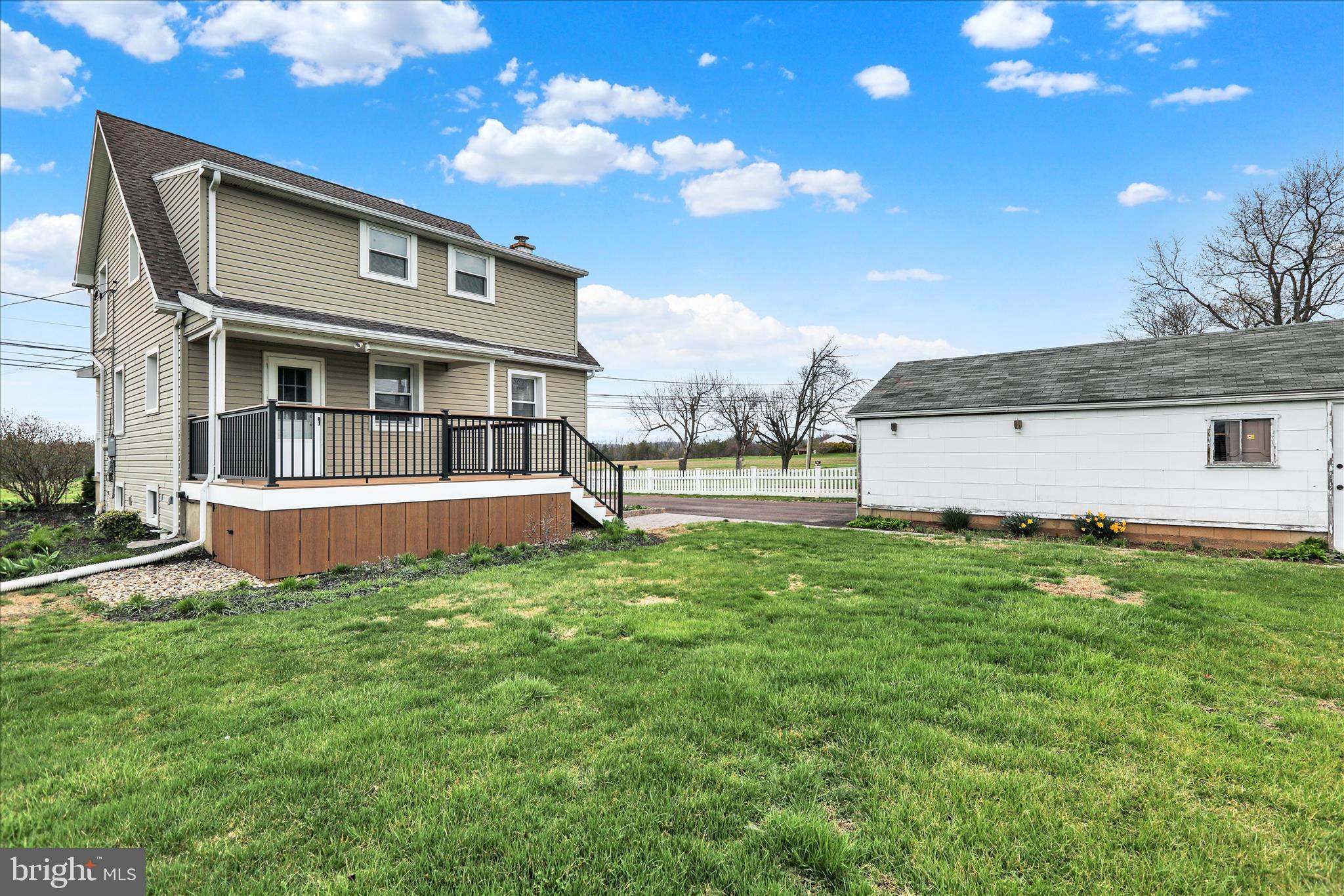 3027 Limekiln Road Birdsboro, PA 19508 - Photo 33 of 37 a view of a house with a yard and sitting area