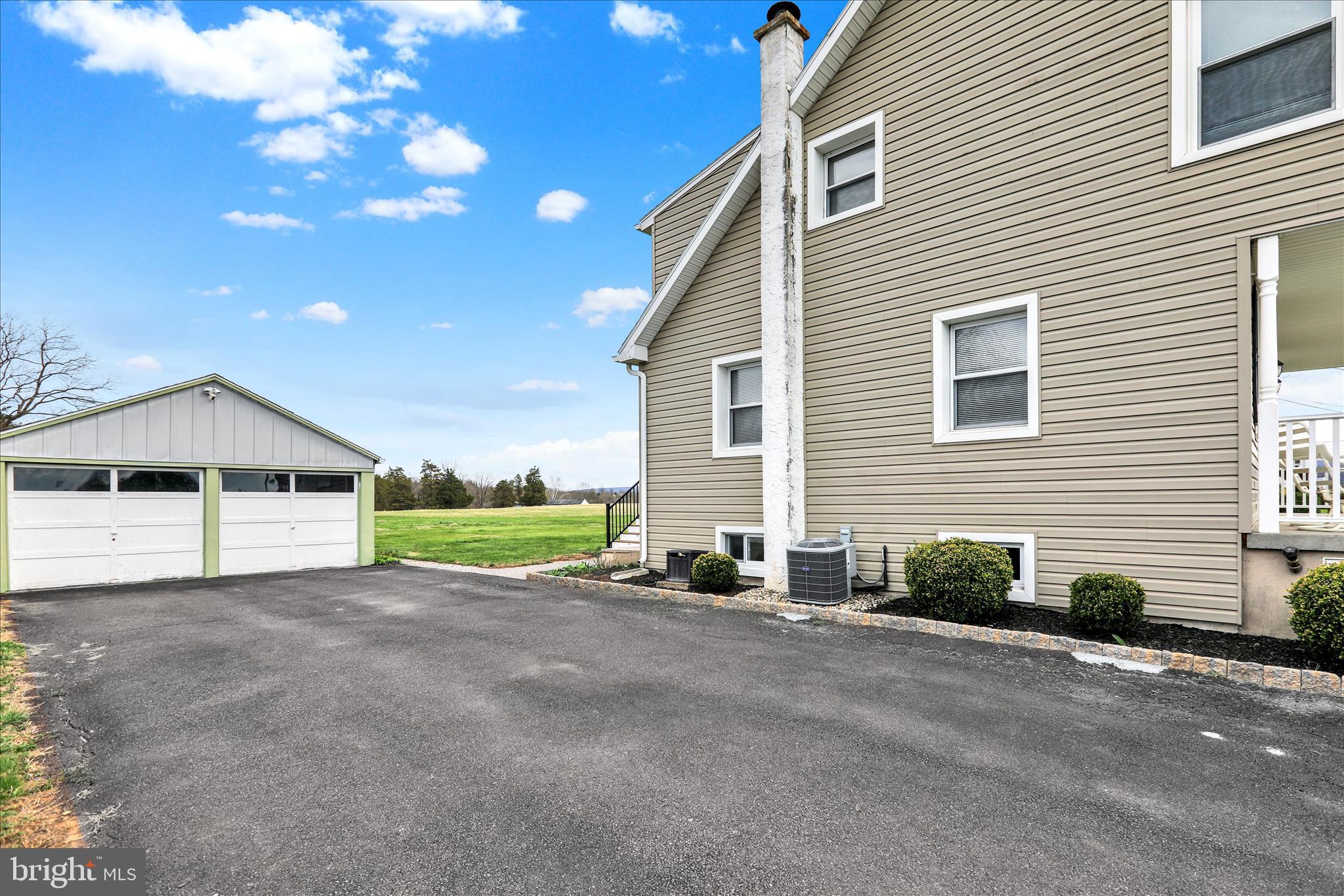 3027 Limekiln Road Birdsboro, PA 19508 - Photo 37 of 37 a view of a house with a backyard and porch