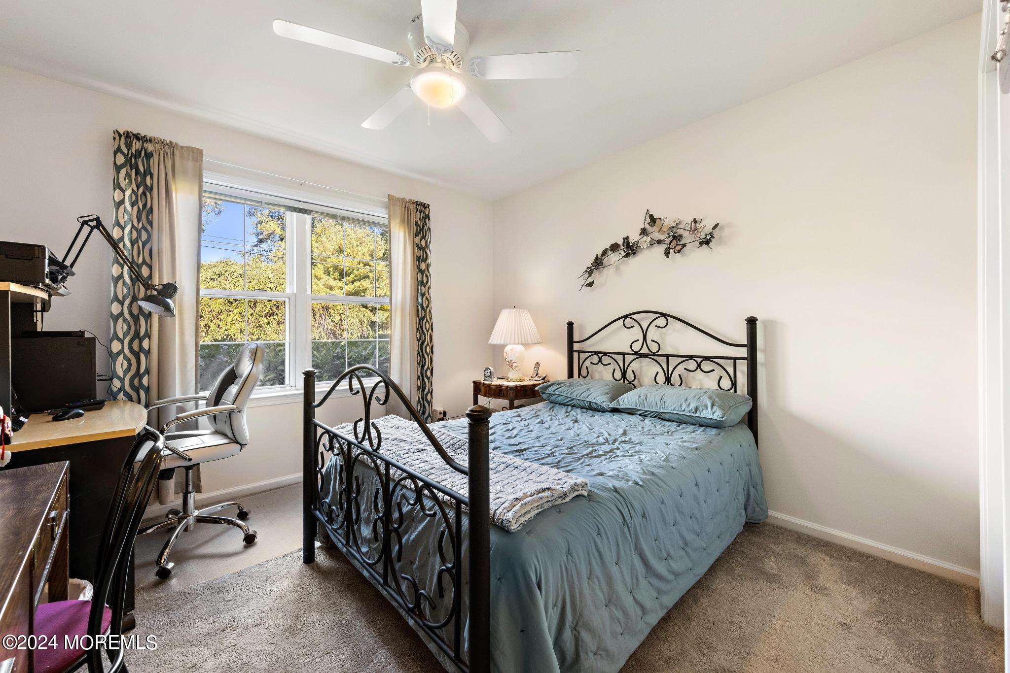133 Wave Road Manahawkin, NJ 08050 - Photo 54 of 62 a bedroom with furniture and a window