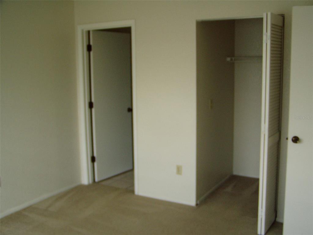 25100 Sandhill Boulevard, Unit 202 Punta Gorda, FL 33983 - Photo 5 of 12 a view of an empty room