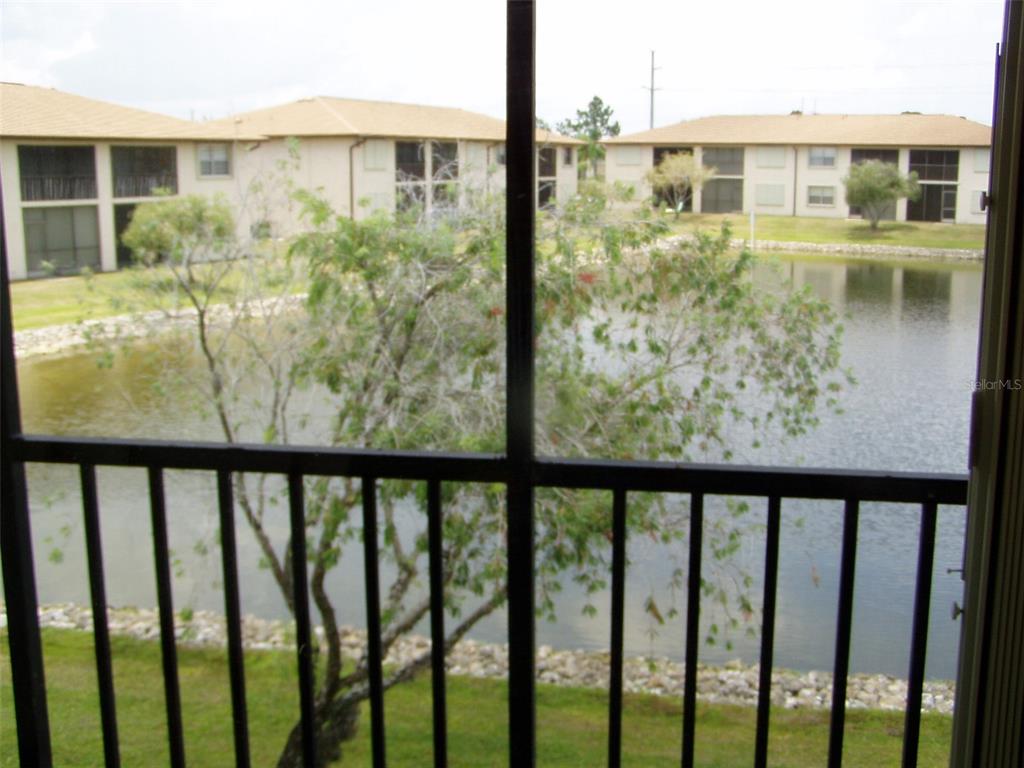25100 Sandhill Boulevard, Unit 202 Punta Gorda, FL 33983 - Photo 6 of 12 a view of a balcony