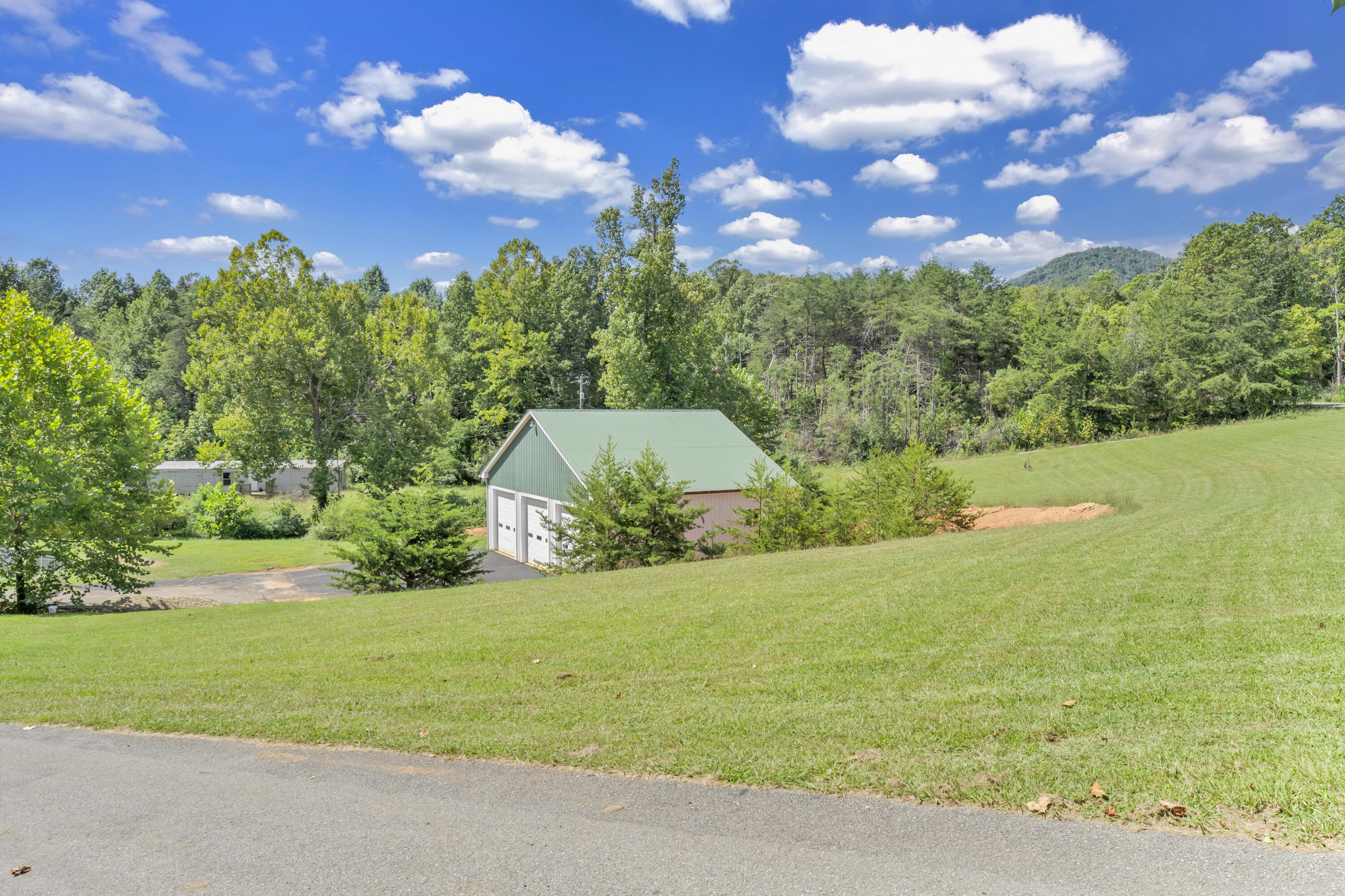 319 Cooks Knob Road Ferrum, VA 24088 - Photo 18 of 80 a view of a building with a big yard