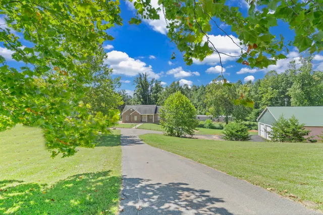 a view of deck with wooden floor and fence