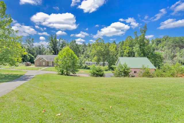 a view of a balcony with wooden floor
