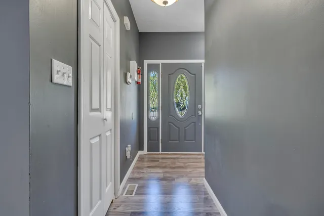 a view of an empty room and window