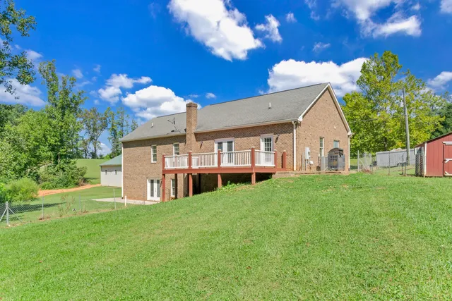 a kitchen with stainless steel appliances a refrigerator and a stove