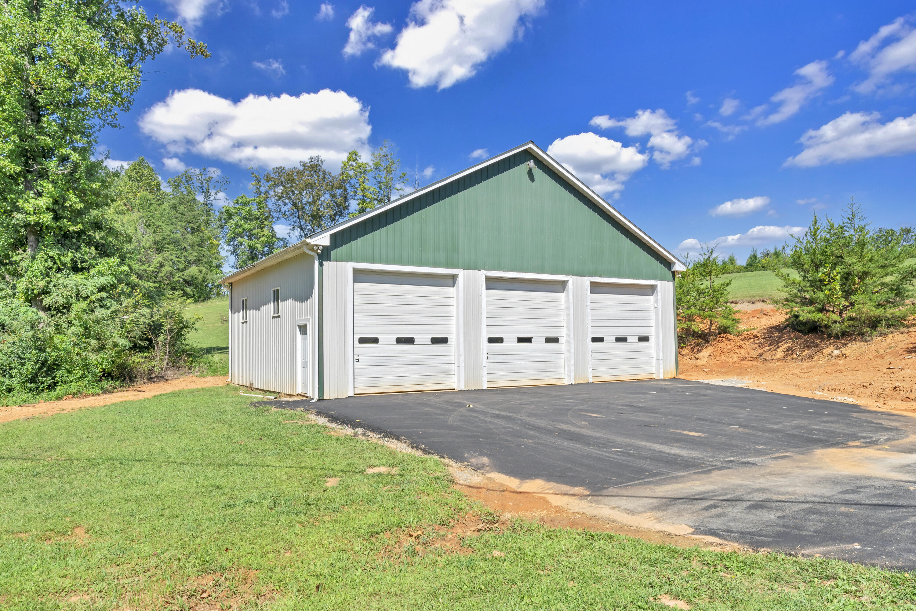 319 Cooks Knob Road Ferrum, VA 24088 - Photo 34 of 80 a view of a house with backyard and garden
