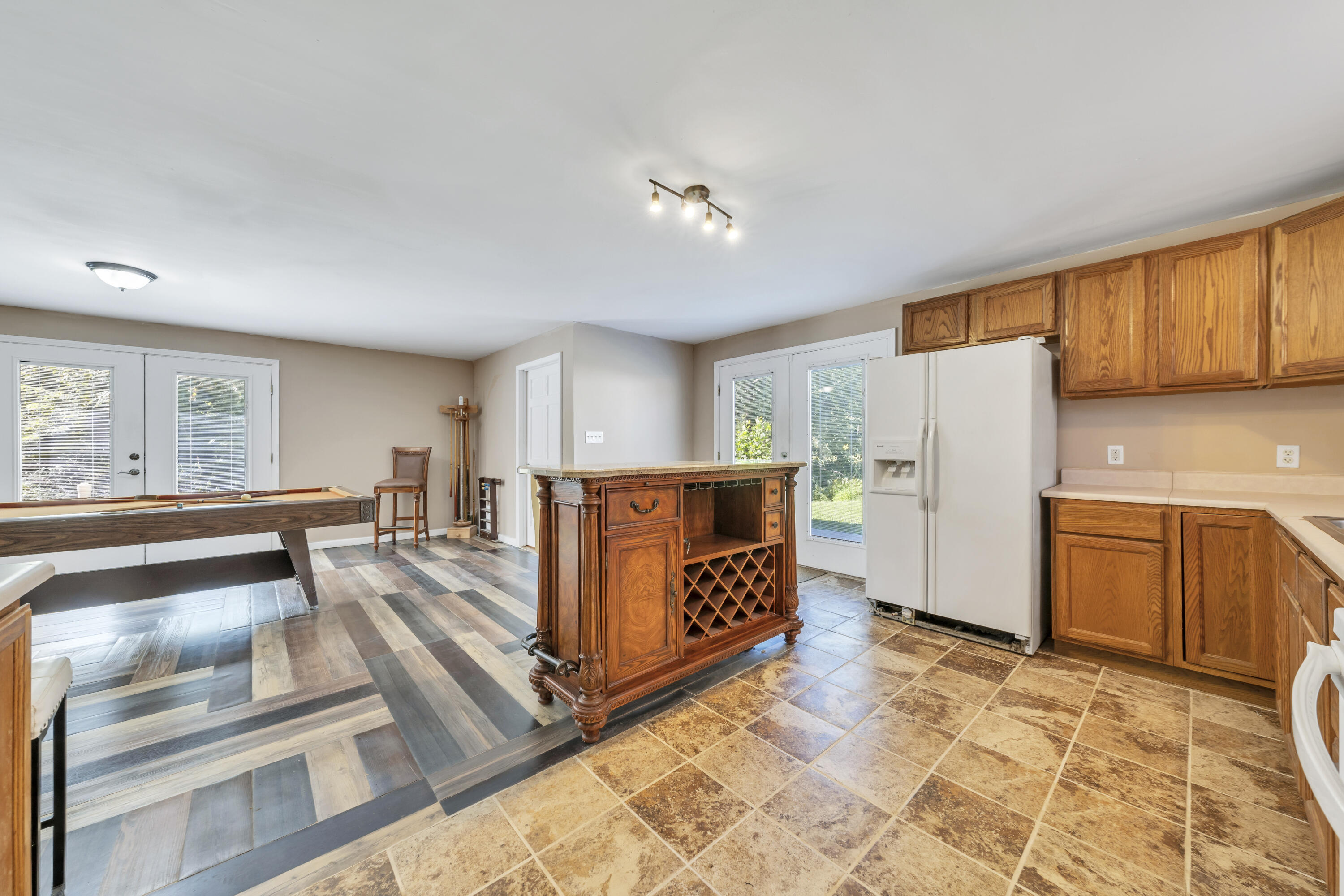 319 Cooks Knob Road Ferrum, VA 24088 - Photo 39 of 80 a kitchen with stainless steel appliances granite countertop a refrigerator and a stove top oven
