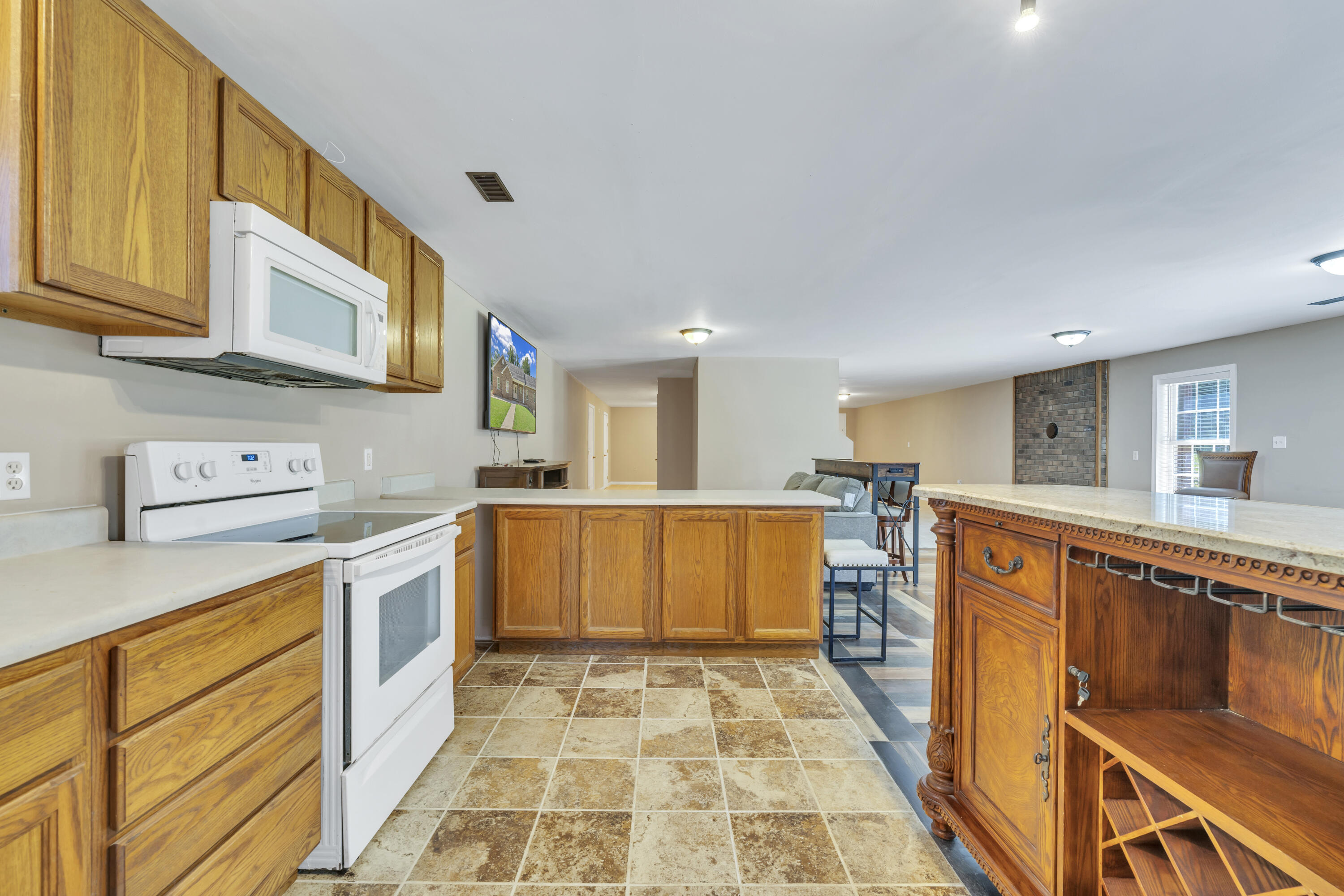 319 Cooks Knob Road Ferrum, VA 24088 - Photo 43 of 80 a kitchen with stainless steel appliances granite countertop a sink and cabinets