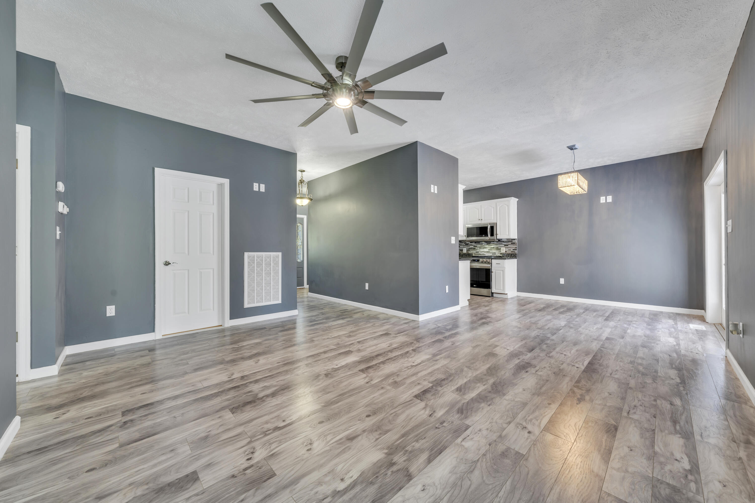 319 Cooks Knob Road Ferrum, VA 24088 - Photo 7 of 80 a view of a kitchen with a sink and a refrigerator