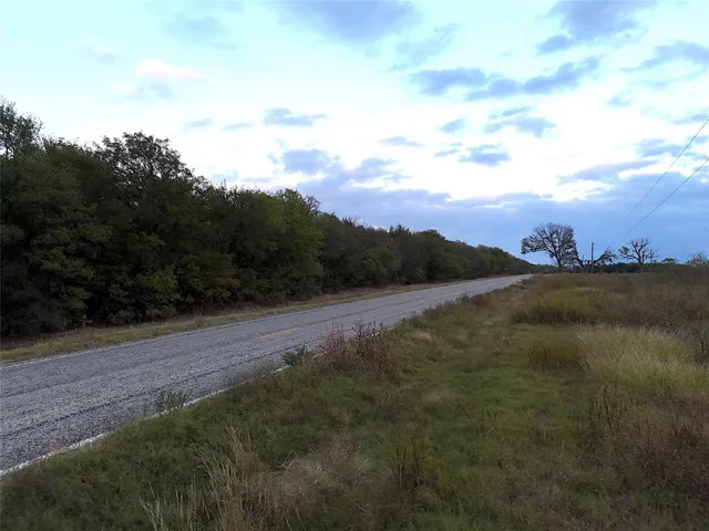 a view of a lake and sunset
