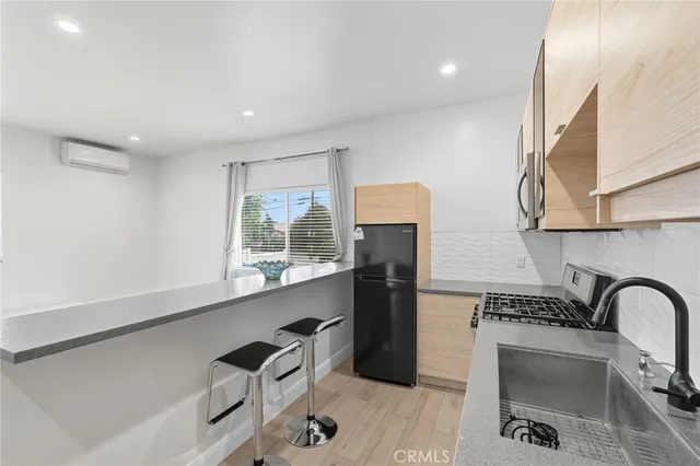 a view of a bathroom from the hallway