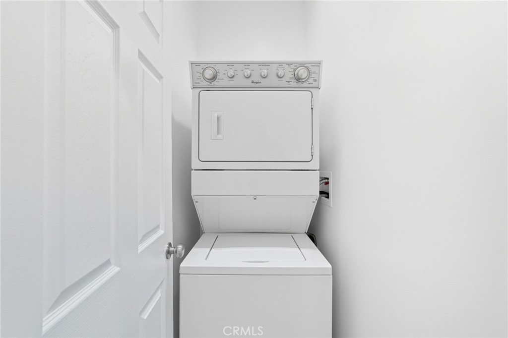 11642 Gothic Avenue Granada Hills, CA 91344 - Photo 22 of 27 a utility room with dryer and washer