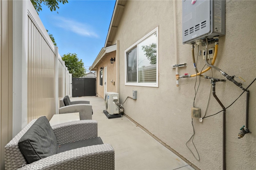 11642 Gothic Avenue Granada Hills, CA 91344 - Photo 6 of 27 a living room with furniture and a window