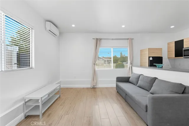 a view of livingroom with furniture and window