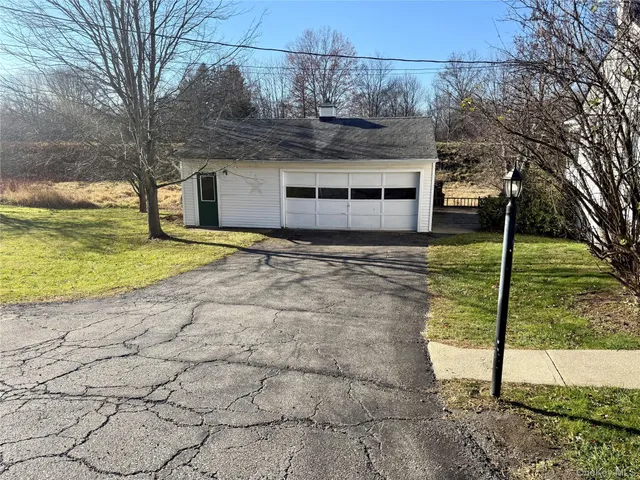 a house view with a backyard space