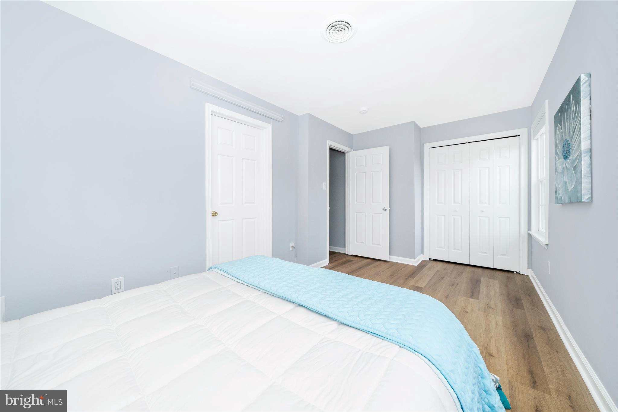 713 Seek Lane Silver Spring, MD 20912 - Photo 30 of 60 a bedroom with a bed and a window