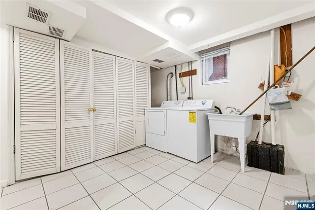 a utility room with cabinets