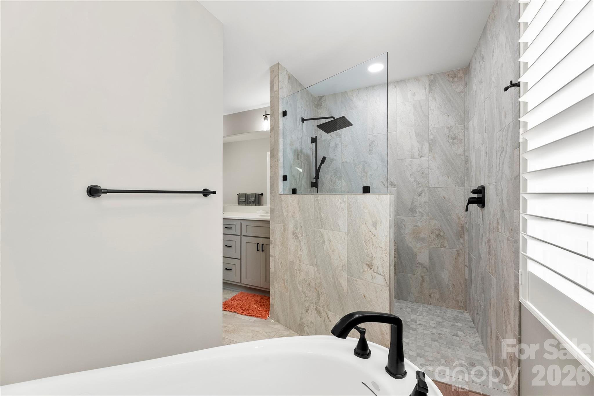 4242 John Ritchie Road Iron Station, NC 28080 - Photo 12 of 46 a bathroom with a shower