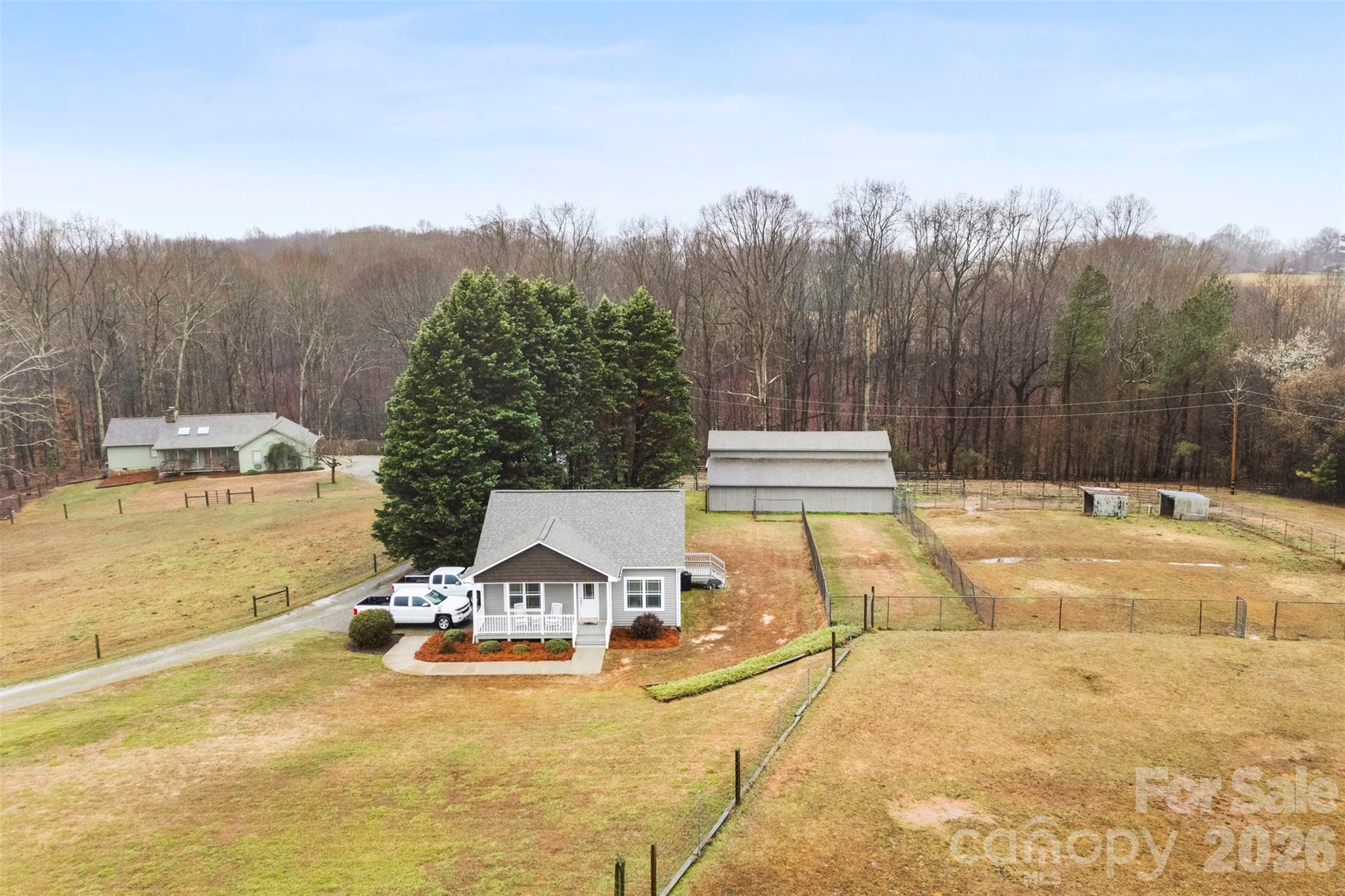 4242 John Ritchie Road Iron Station, NC 28080 - Photo 29 of 46 a view of a swimming pool with a yard and large tree