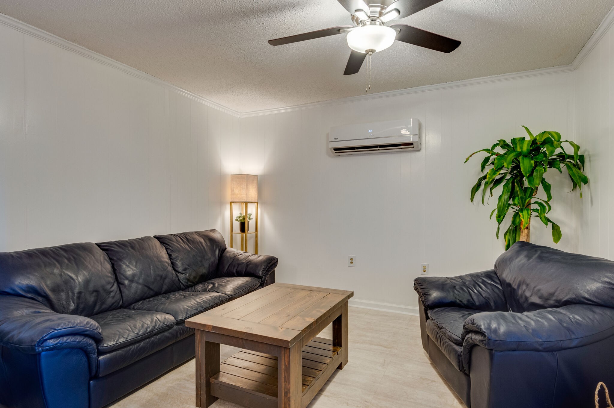 2113 Toby Robertson Road Spring Hill, TN 37174 - Photo 14 of 24 a living room with furniture and a chandelier