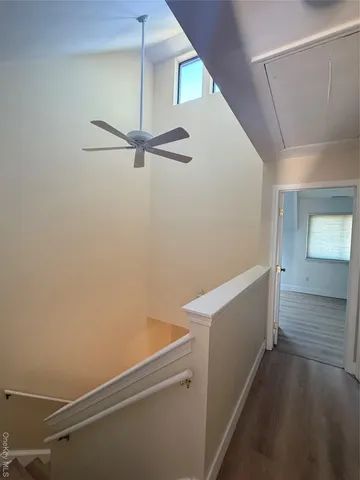 a view of a hallway with closet