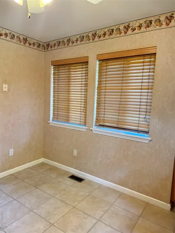 a view of a room that has a window in it