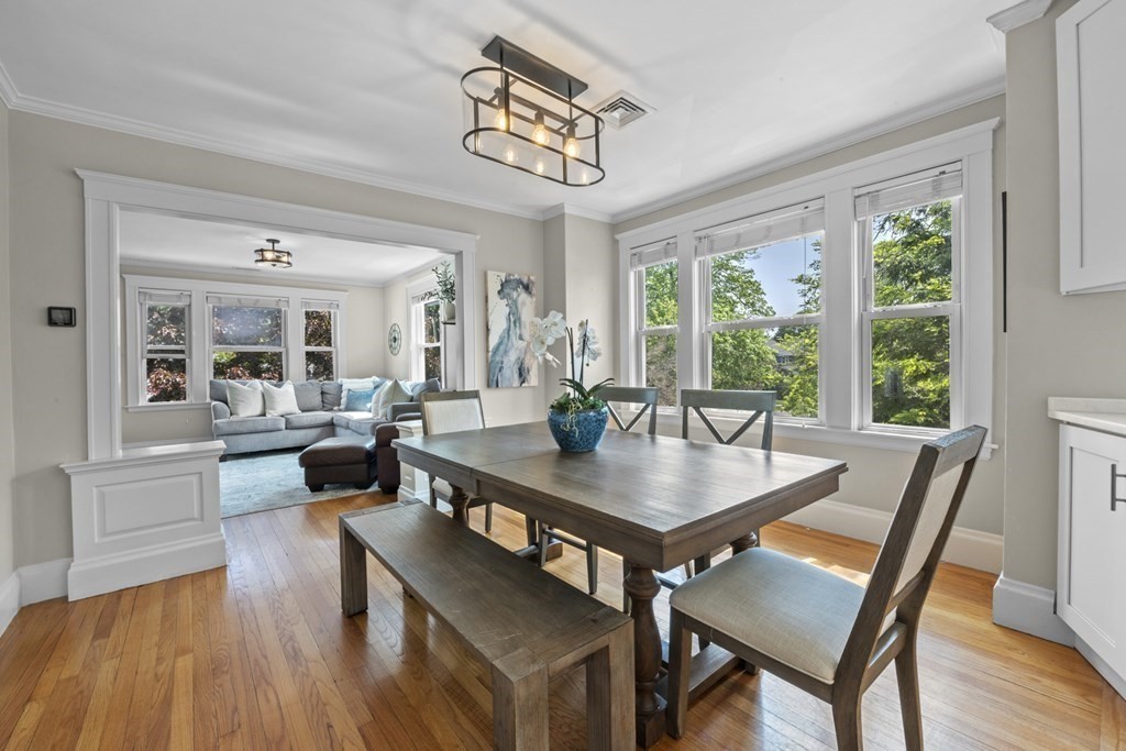 26 Cedar Street, Unit 2 Marblehead, MA 01945 - Photo 12 of 37 a view of a dining room with furniture window and wooden floor