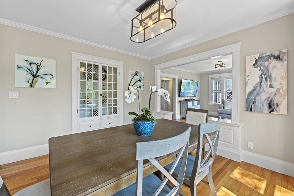 26 Cedar Street, Unit 2 Marblehead, MA 01945 - Photo 13 of 37 a dining room with furniture and wooden floor