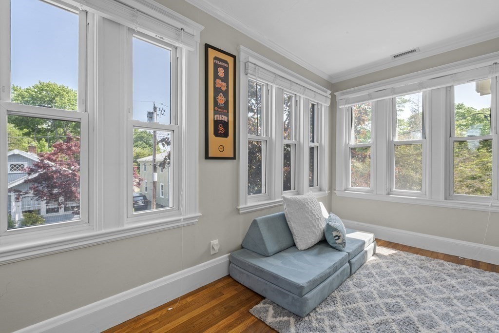 26 Cedar Street, Unit 2 Marblehead, MA 01945 - Photo 25 of 37 a living room with furniture and a window