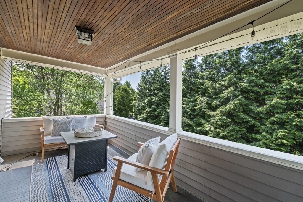 26 Cedar Street, Unit 2 Marblehead, MA 01945 - Photo 34 of 37 a view of balcony with furniture and wooden deck