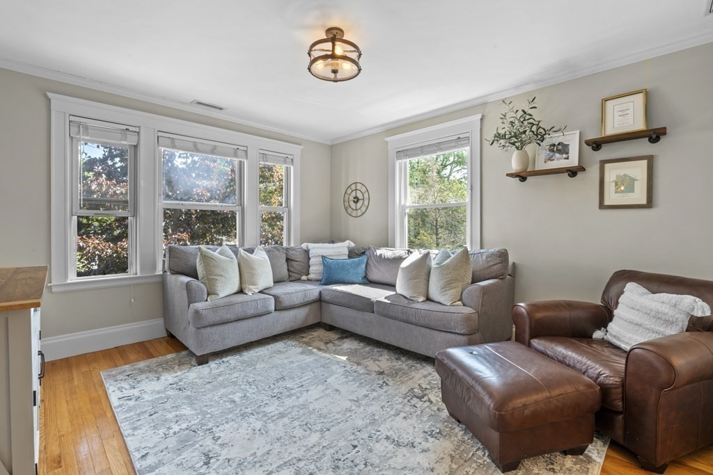 26 Cedar Street, Unit 2 Marblehead, MA 01945 - Photo 8 of 37 a living room with furniture and a window