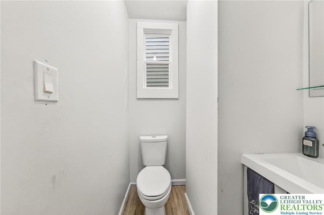 22 South 1st Street Bangor, PA 18013 - Photo 24 of 79 a white toilet sitting next to a sink