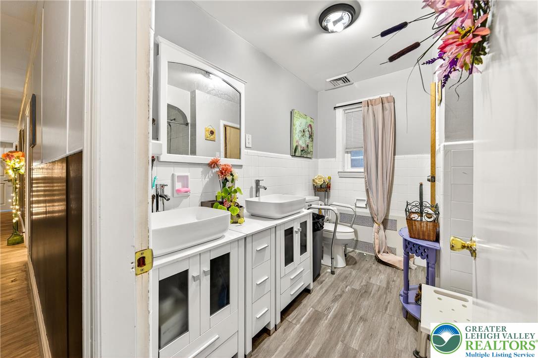 22 South 1st Street Bangor, PA 18013 - Photo 52 of 79 a kitchen with stainless steel appliances a stove a sink and a refrigerator