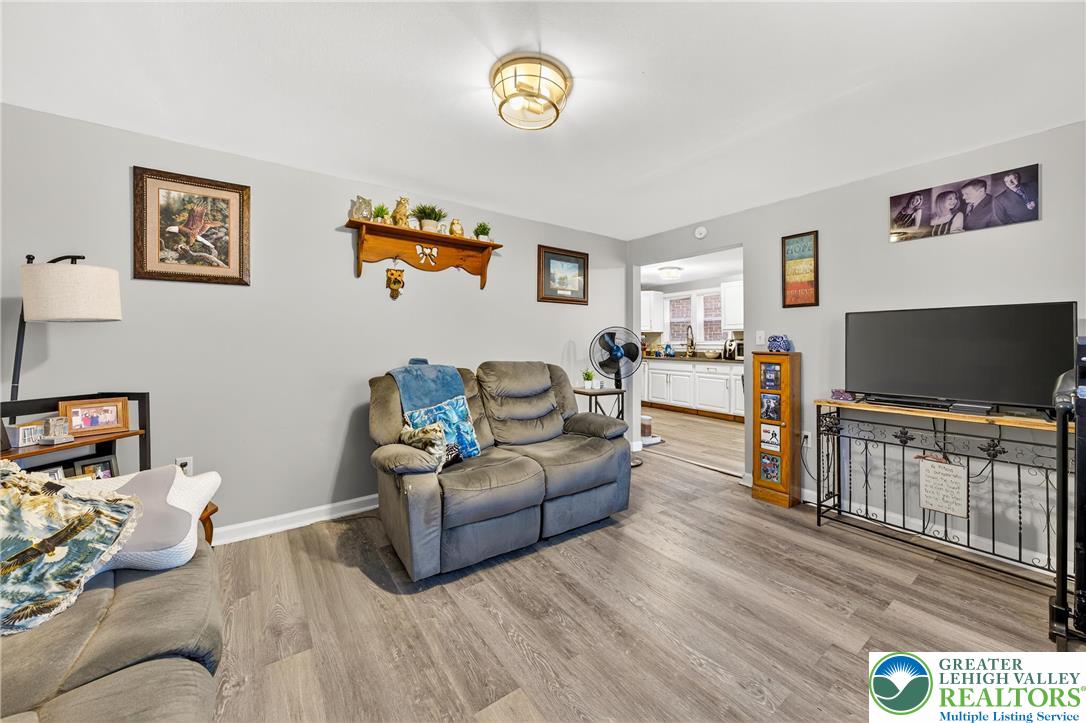 22 South 1st Street Bangor, PA 18013 - Photo 60 of 79 a living room with furniture and a flat screen tv