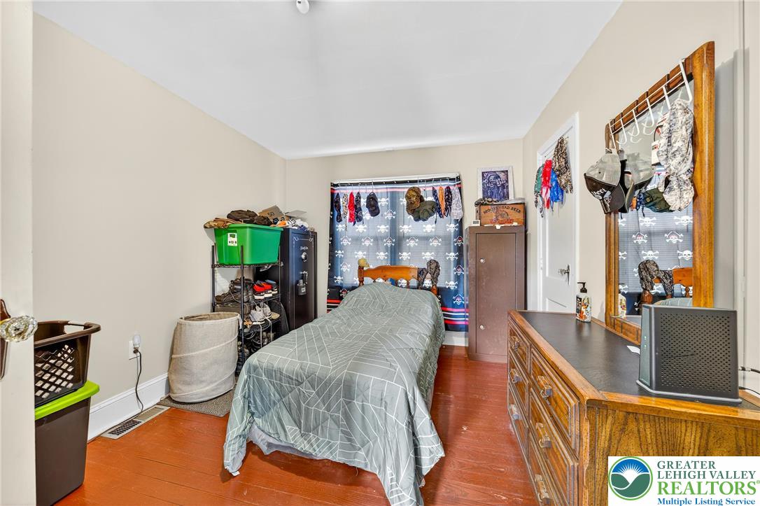 22 South 1st Street Bangor, PA 18013 - Photo 61 of 79 a living room with furniture and a flat screen tv