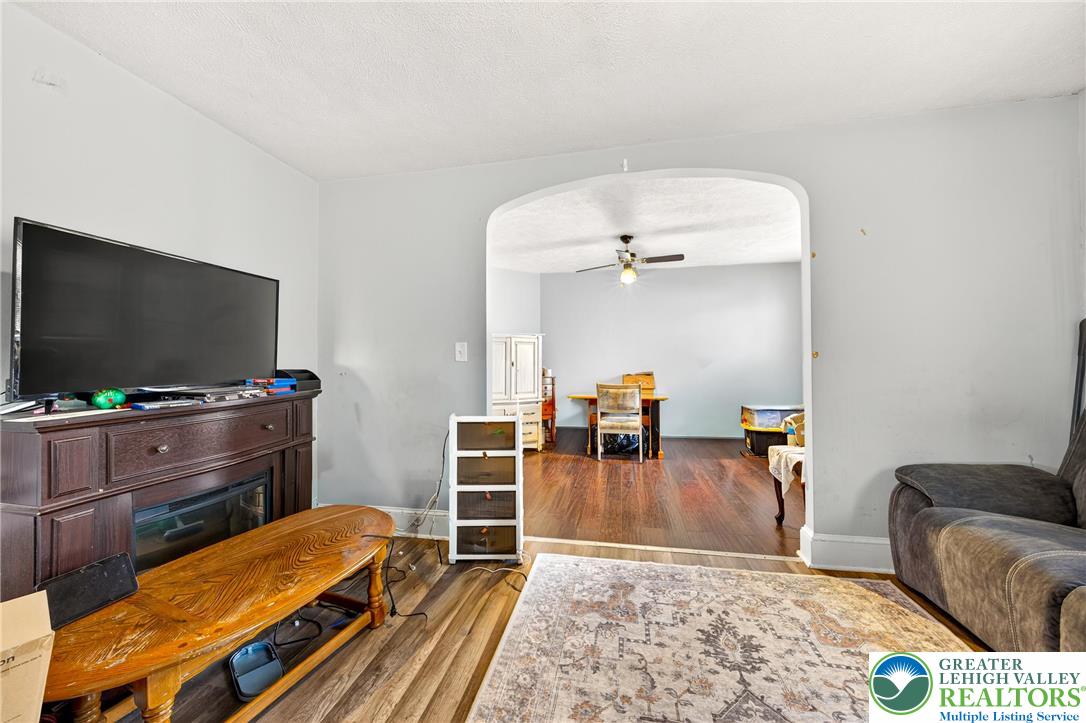 22 South 1st Street Bangor, PA 18013 - Photo 67 of 79 a living room with furniture and a flat screen tv