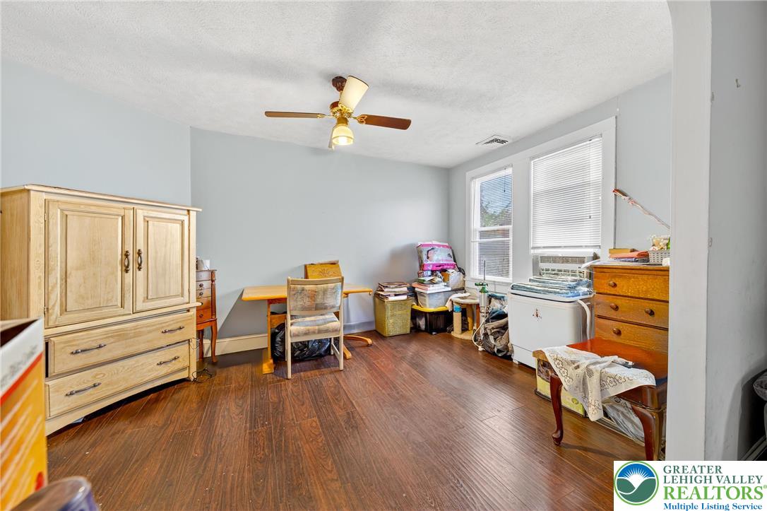 22 South 1st Street Bangor, PA 18013 - Photo 69 of 79 a living room with furniture and a wooden floor