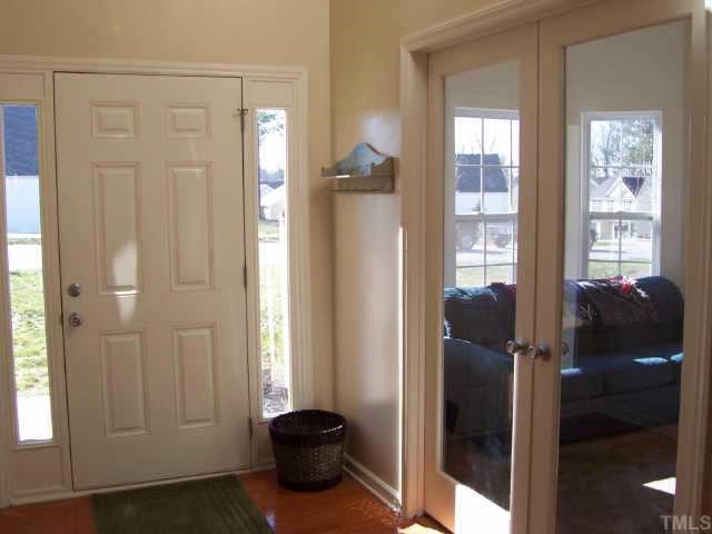 164 Trevor Ridge Drive Holly Springs, NC 27540 - Photo 3 of 12 a view of a room with windows and closet