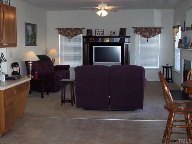 164 Trevor Ridge Drive Holly Springs, NC 27540 - Photo 7 of 12 a living room with furniture